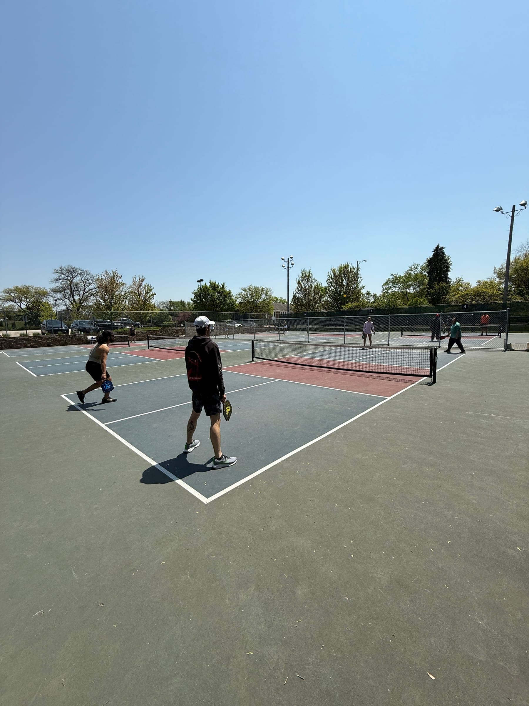 Team pickleball on outdoor courts